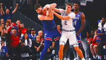 Kansas center Hunter Dickinson ejected for kicking Duke's Maliq Brown in the head